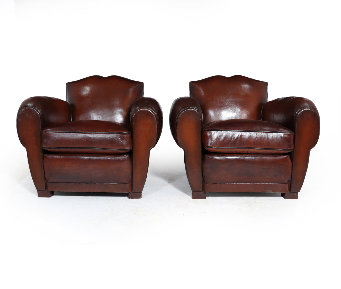 Pair of 1930’s Moustache Back French Leather Club Chairs