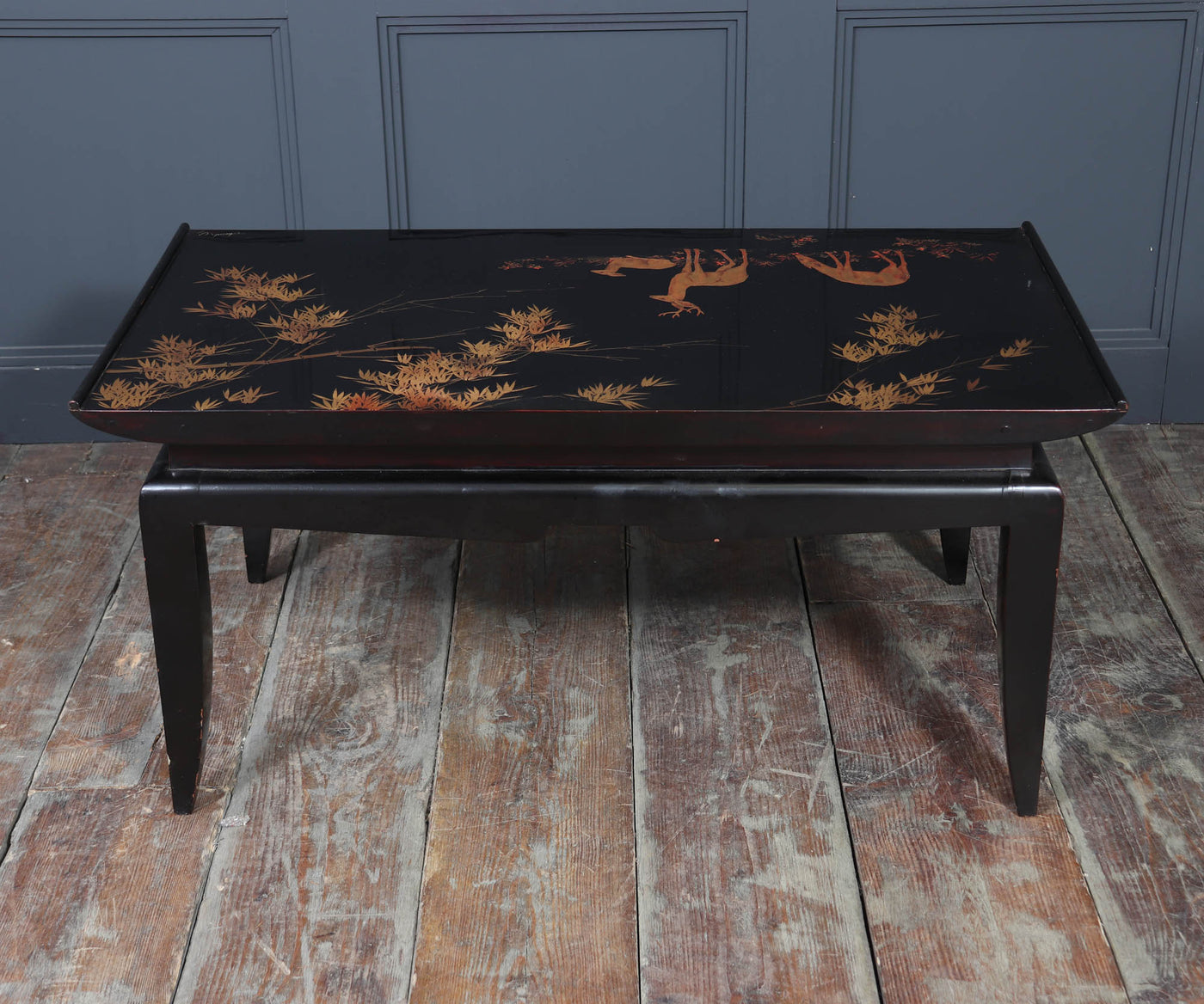 Black lacquer and gilt coffee table