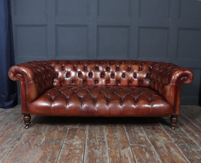 Antique Deep Buttoned Chesterfield Sofa in Hand-Dyed Chestnut brown Leather, c.1900