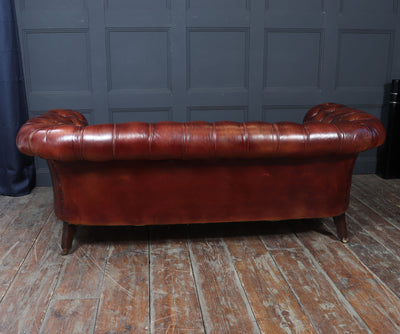 Antique Deep Buttoned Chesterfield Sofa in Hand-Dyed Chestnut brown Leather, c.1900
