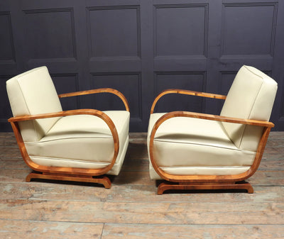 PAIR OF ART DECO LEATHER AND WALNUT ARMCHAIRS