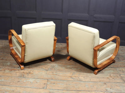 PAIR OF ART DECO LEATHER AND WALNUT ARMCHAIRS