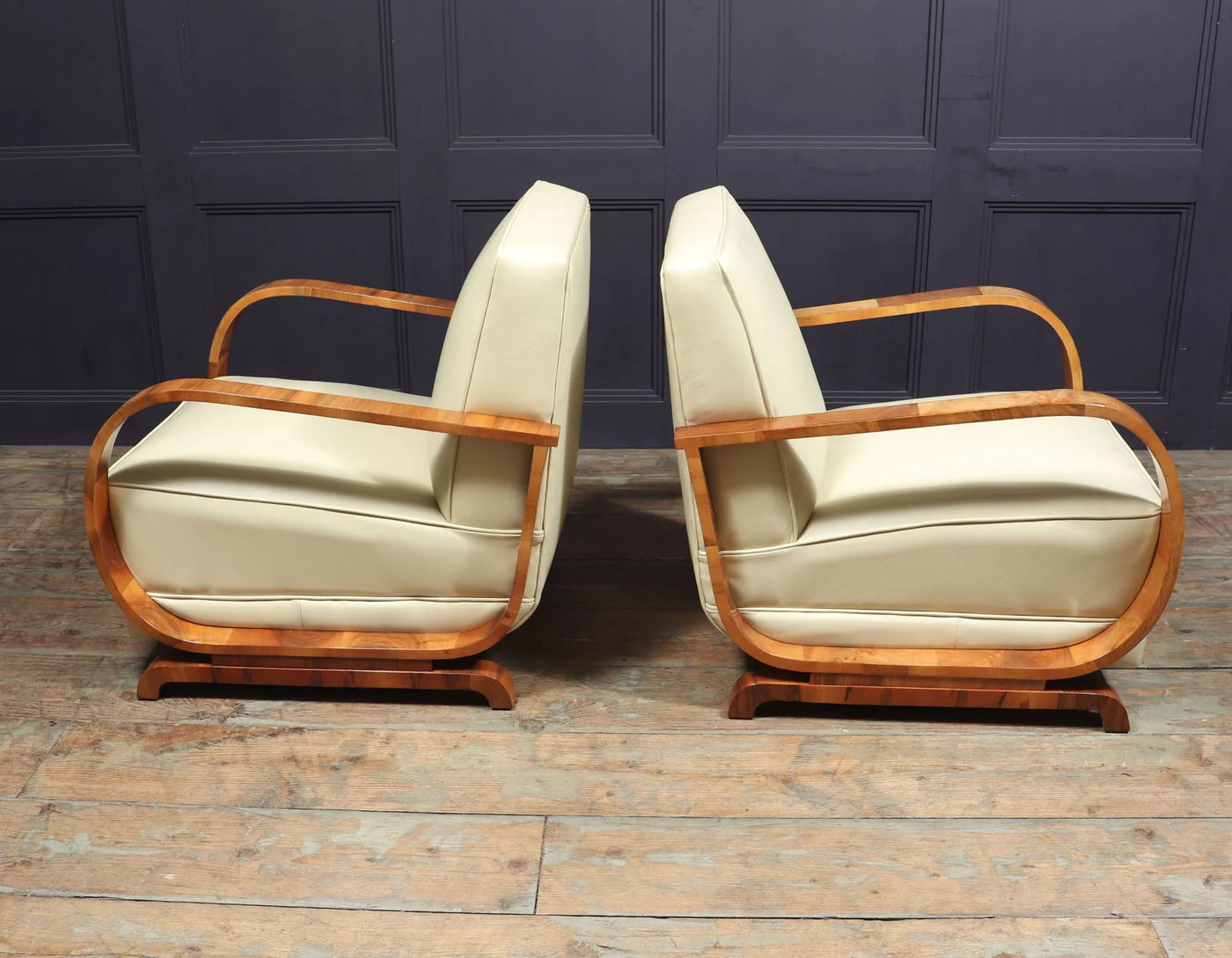 PAIR OF ART DECO LEATHER AND WALNUT ARMCHAIRS