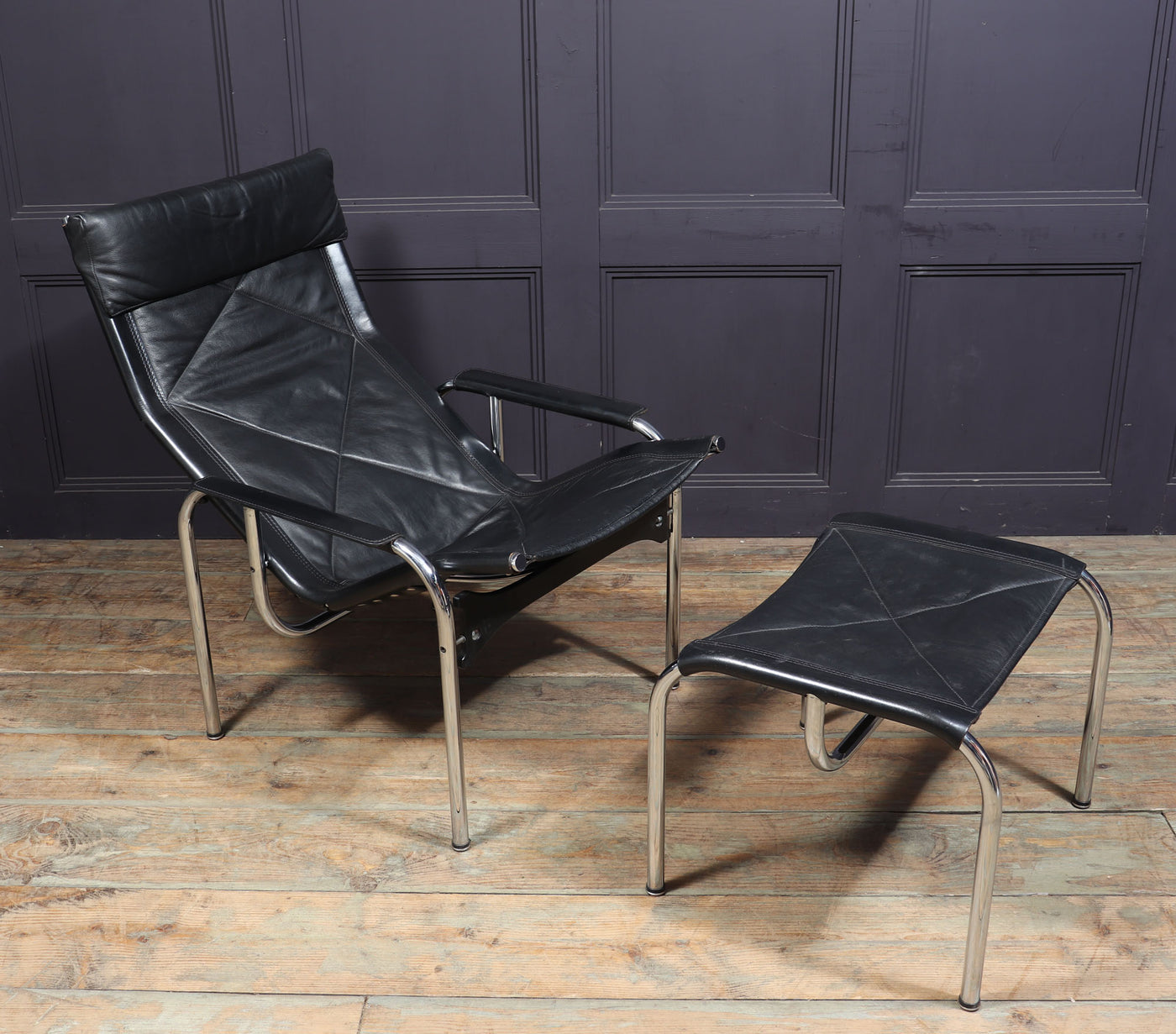 Mid Century Leather Armchair and stool by Hans Eichenberger room