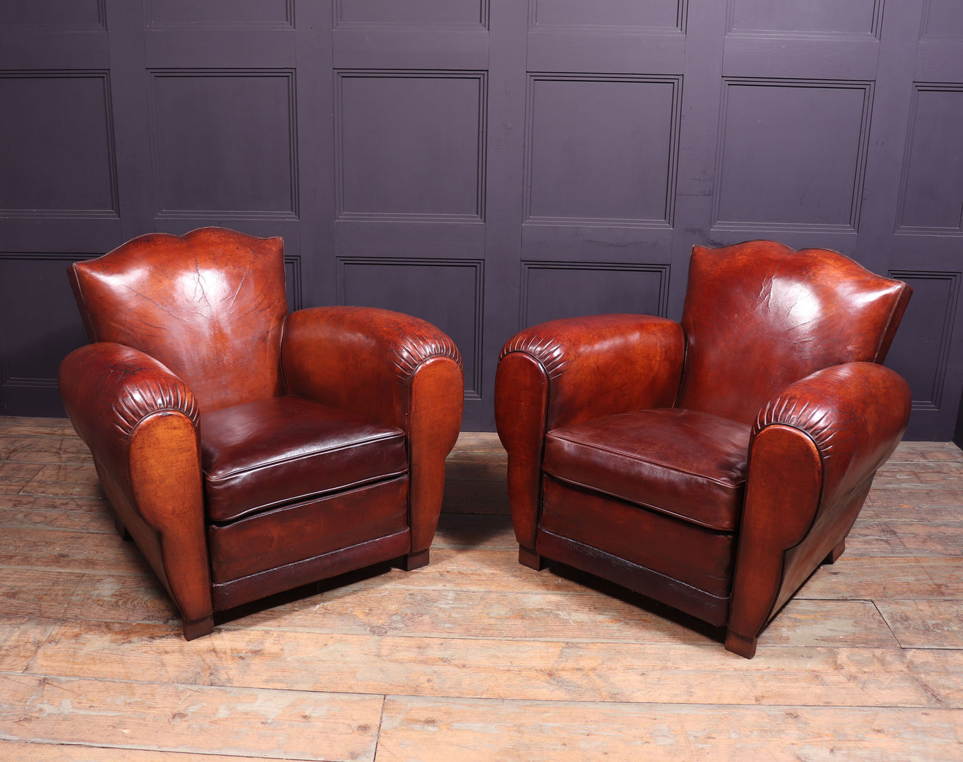 Pair of French Leather Moustache Back Club Chairs room