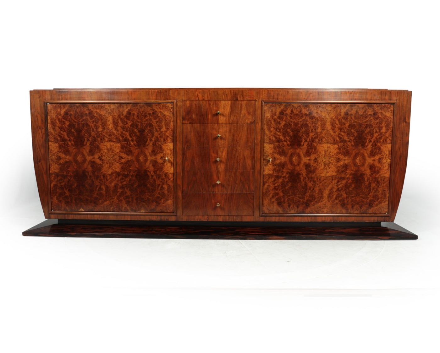 French Art Deco Sideboard A large French Art Deco sideboard, produced in walnut with burr walnut on the doors and crown cut Macassar ebony on the base. There are five central lockable drawers and two large doors with shelves behind, the sideboard has been fully hand polished and is in excellent condition throughout.
