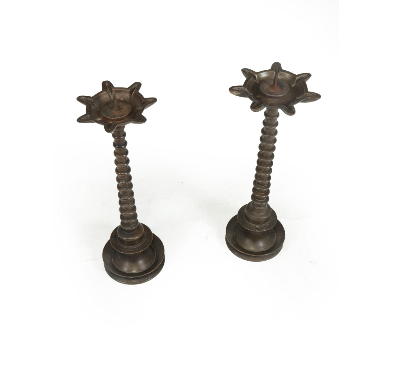 Pair of 19th century Bronze bobbin Candlesticks top