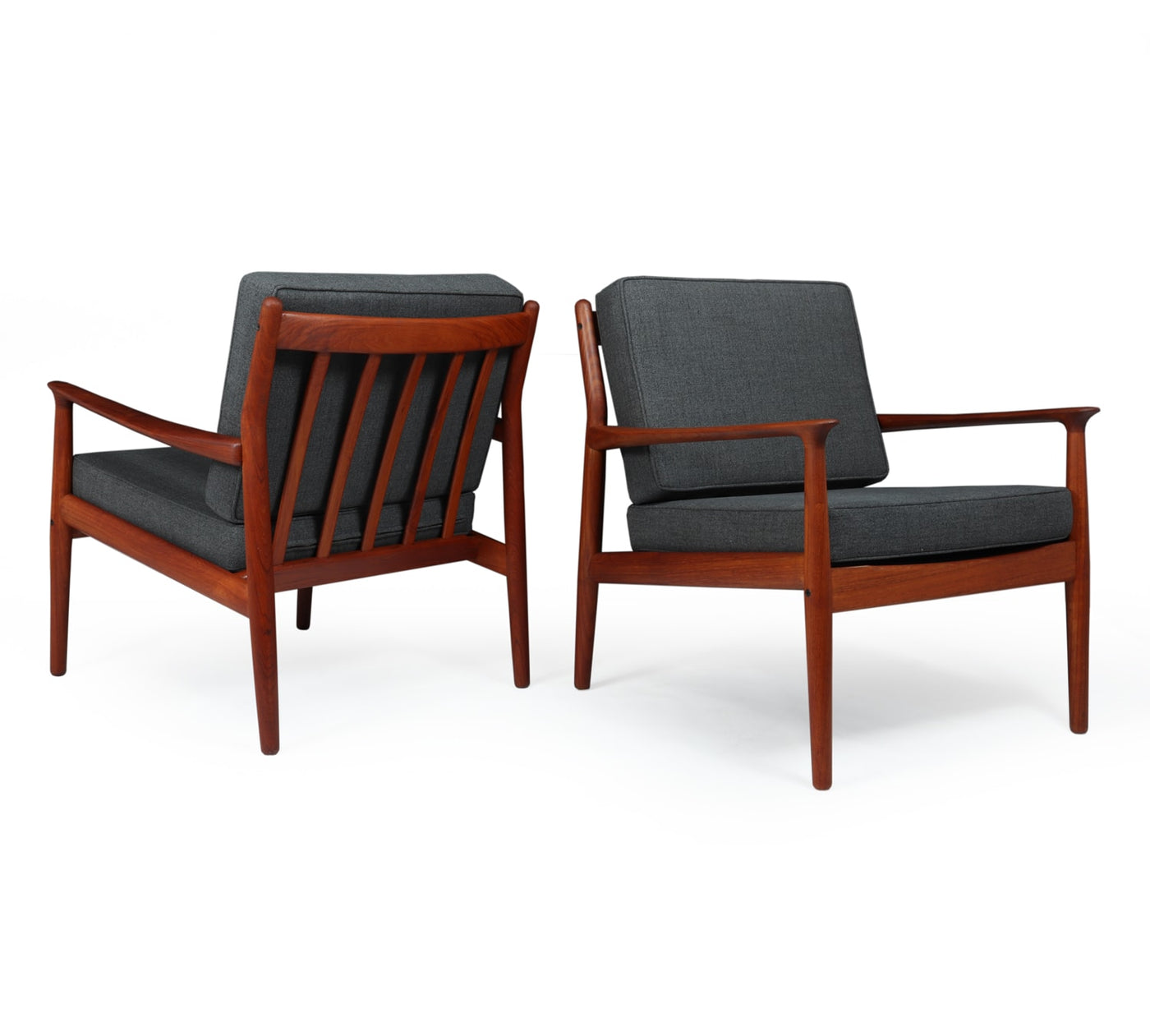A Pair of Mid century Danish Teak Armchairs